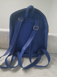 Blue backpack with Maria - Mochila azul con Maria